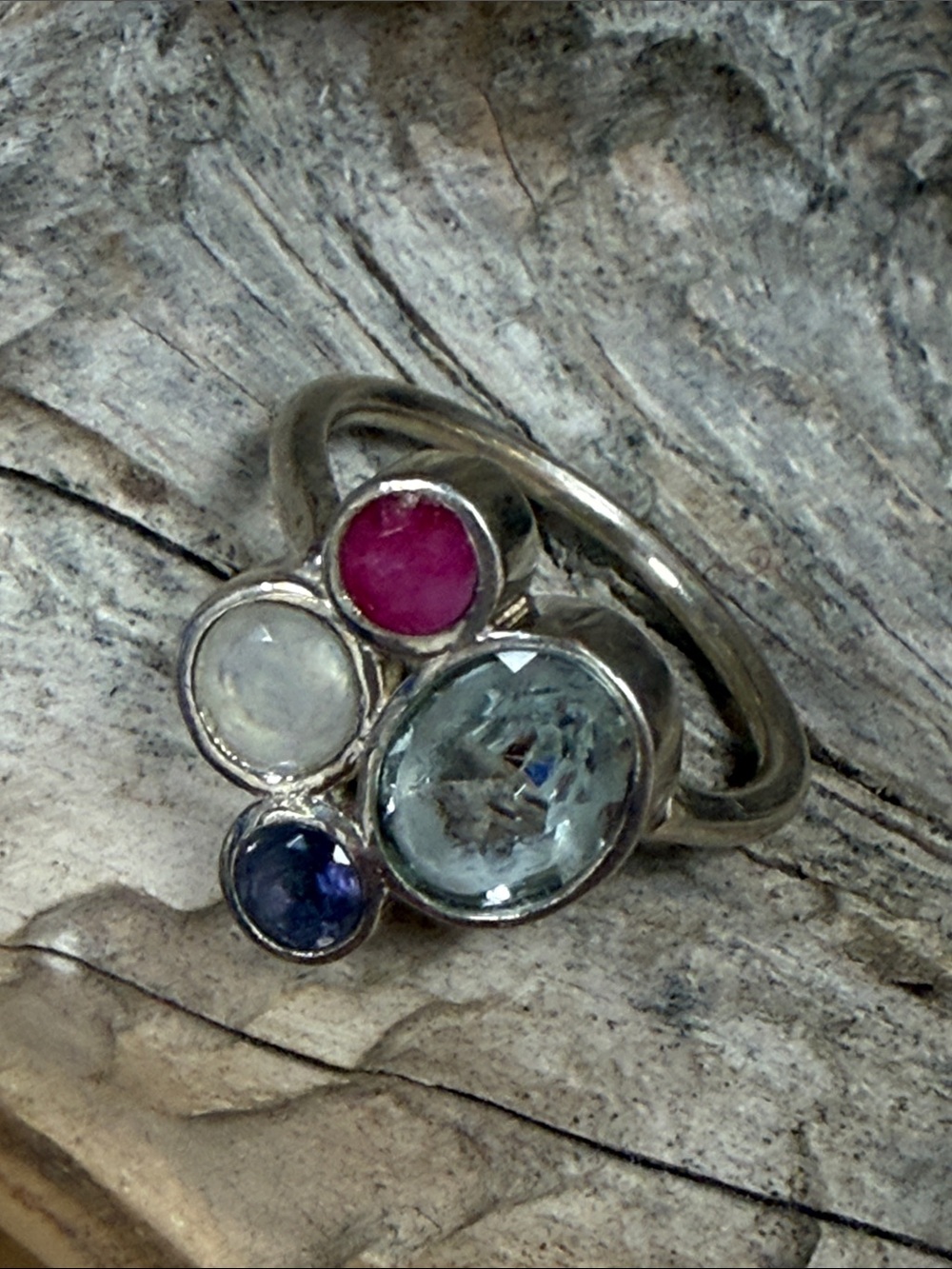 Sterling Silver ring with bezeled iolite, moonstone, ruby and aquamarine. New!